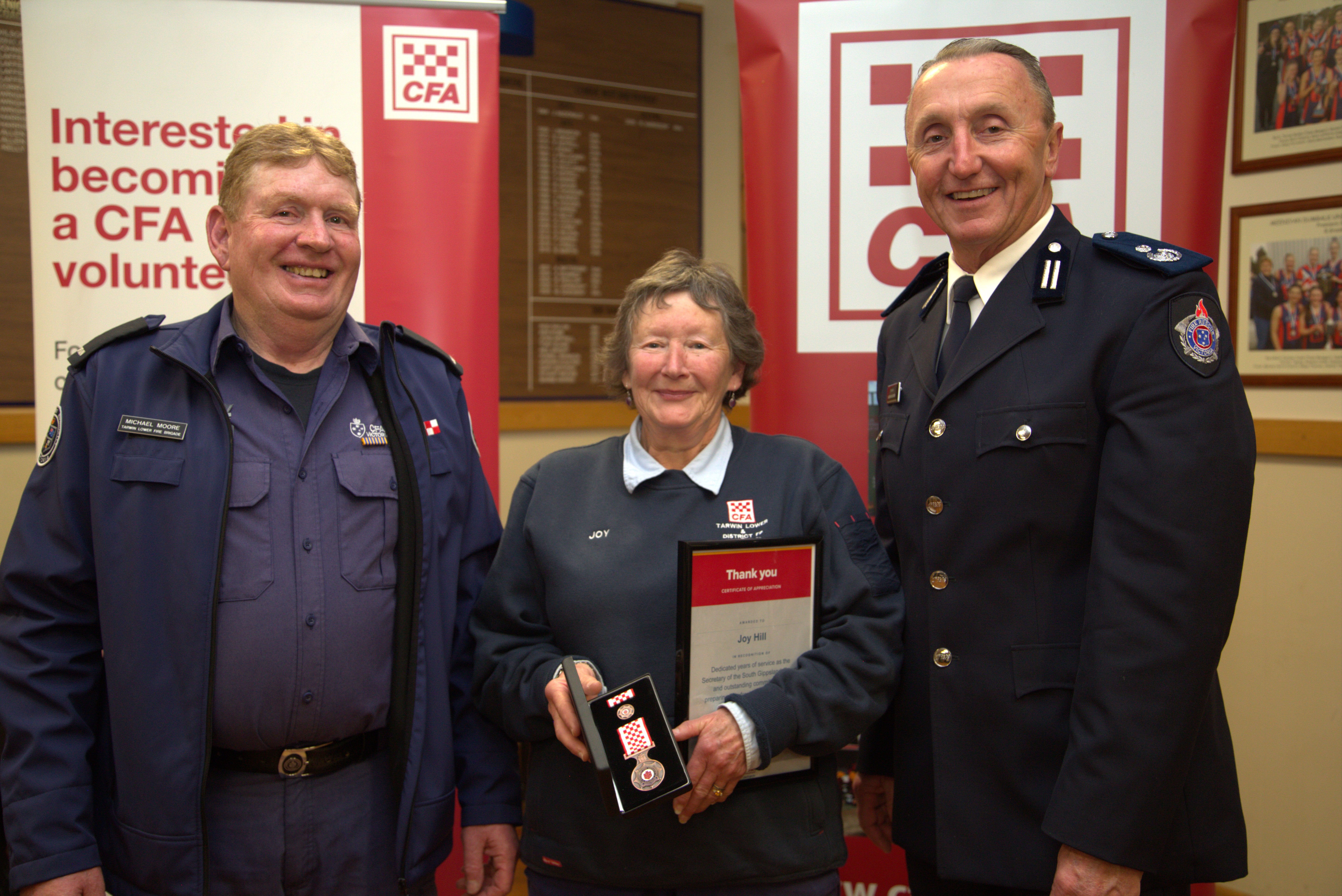Tarwin Lower & District, and Group Secretary Joy Hill, centre, was presented with a 10 year service medal by Captain Mick Moore, and District 9 Commander Andrew McCartney. She was also presented with a surprise certificate of thanks for serving as th